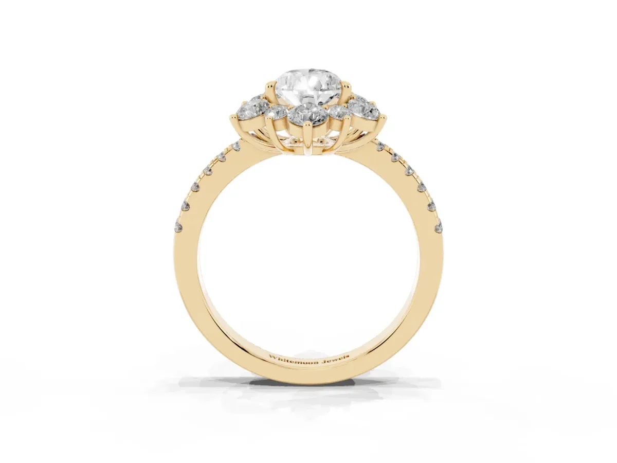 Pear Cut Diamond Floral Halo Ring with Round Pavé Band and Prong Setting Yellow gold