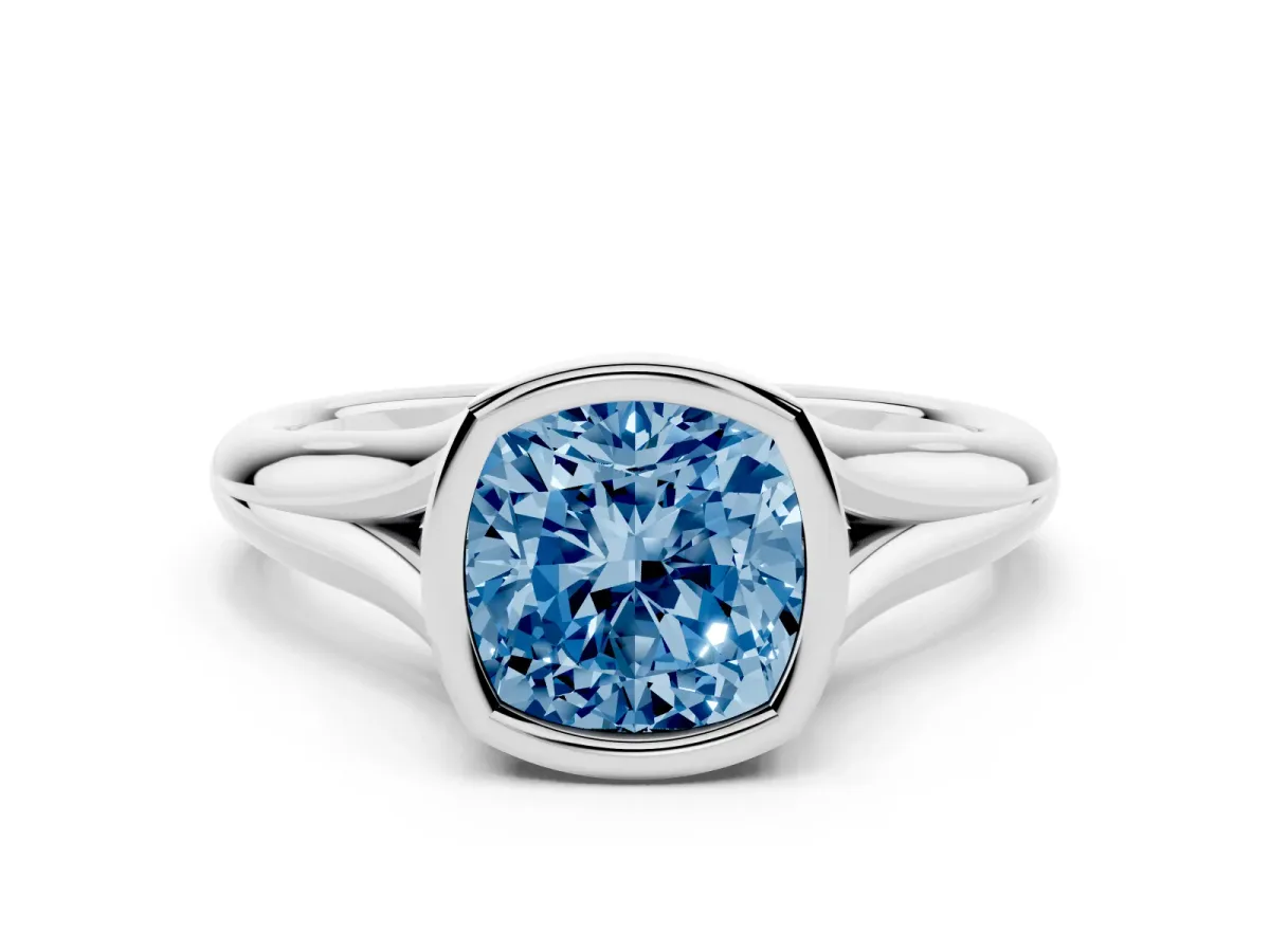 Fancy Blue Bezel Set Cushion Cut Solitaire Diamond Ring with Smooth Band Platinum