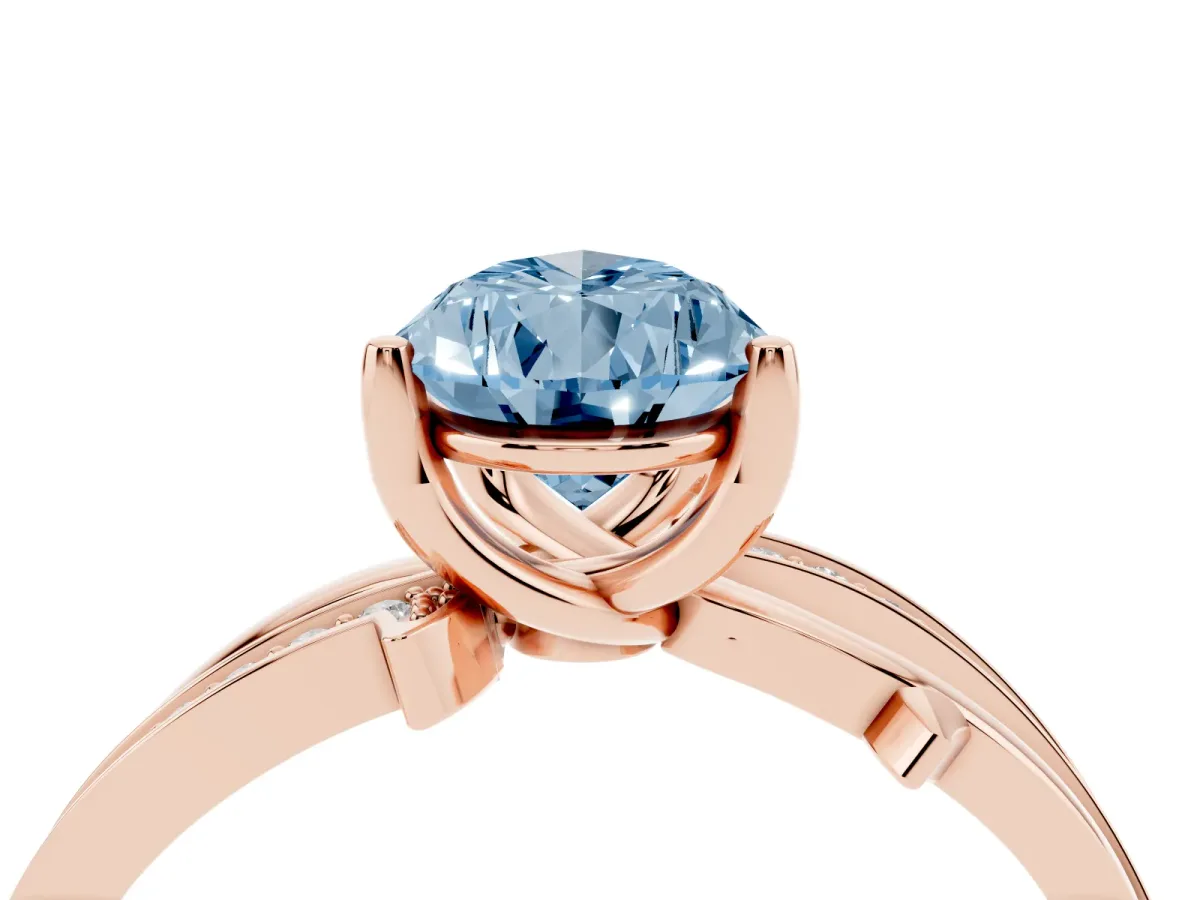 Fancy Blue Pear Cut Solitaire Twist Band with Pavé Accents and Four-Prong Setting Rose gold
