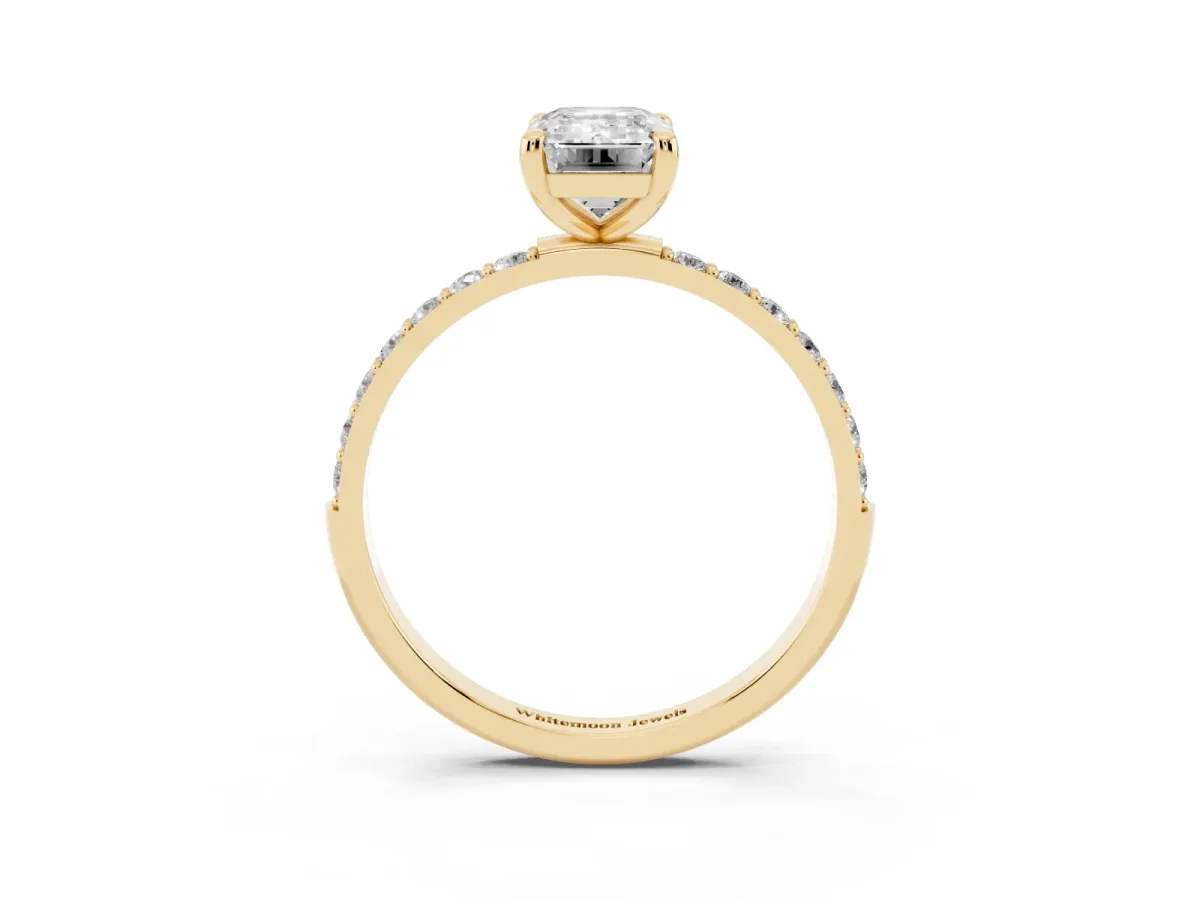 Emerald Cut Diamond Solitaire Ring with Round Pavé Band and Prong Setting Yellow gold