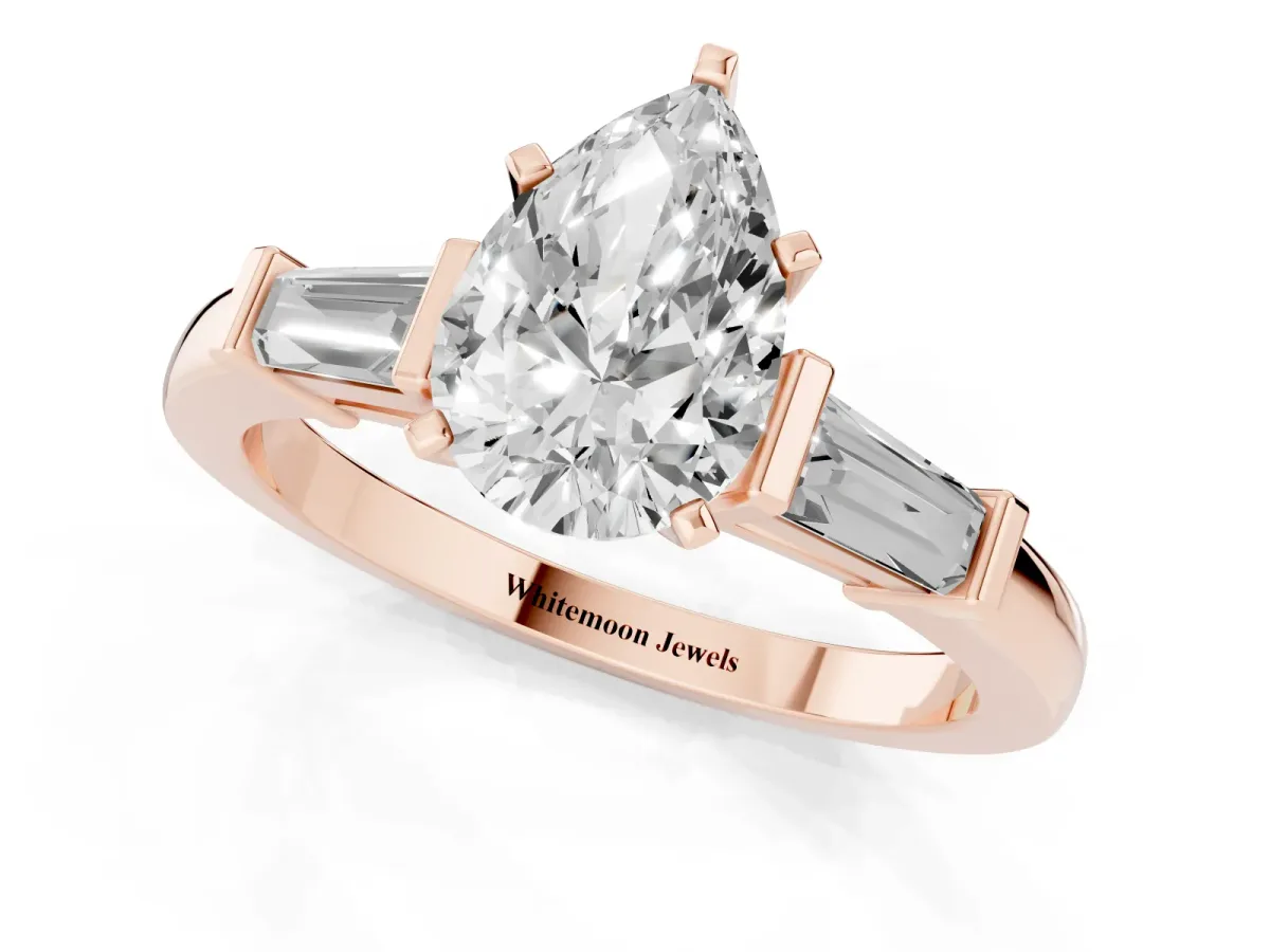 Pear Cut Cut Diamond Solitaire Ring with Tapered Baguette Accents and Four-Prong Setting Rose gold
