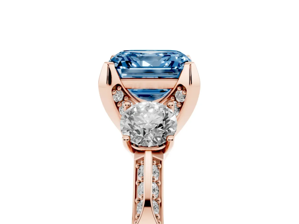 Fancy Blue Asscher Cut Brilliant Three-Stone Diamond Ring with Pavé Band and Four-Prong Setting Rose gold