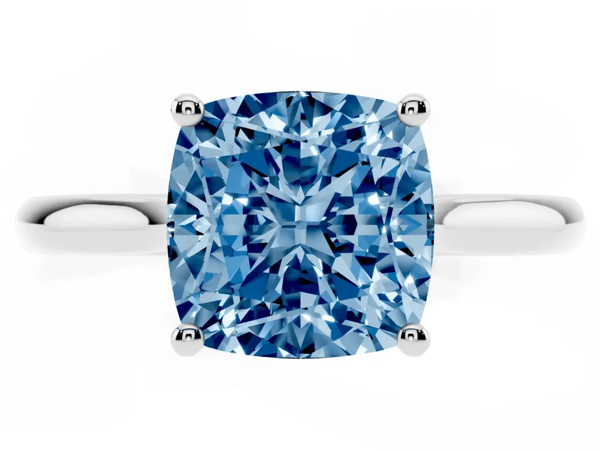 Fancy Blue Cushion Cut Cut Solitaire Ring with Cathedral Band and Four-Prong Setting Silver