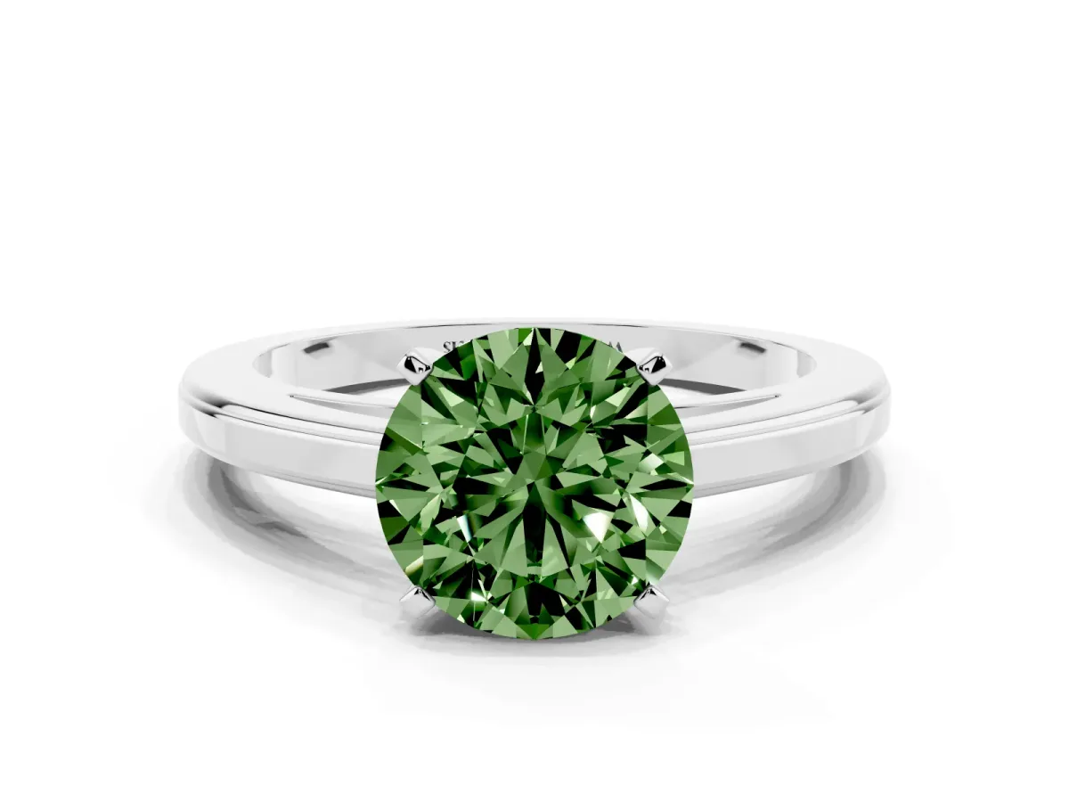Fancy Green Round Cut Solitaire Diamond Ring with Four-Prong Setting and Classic Band Silver