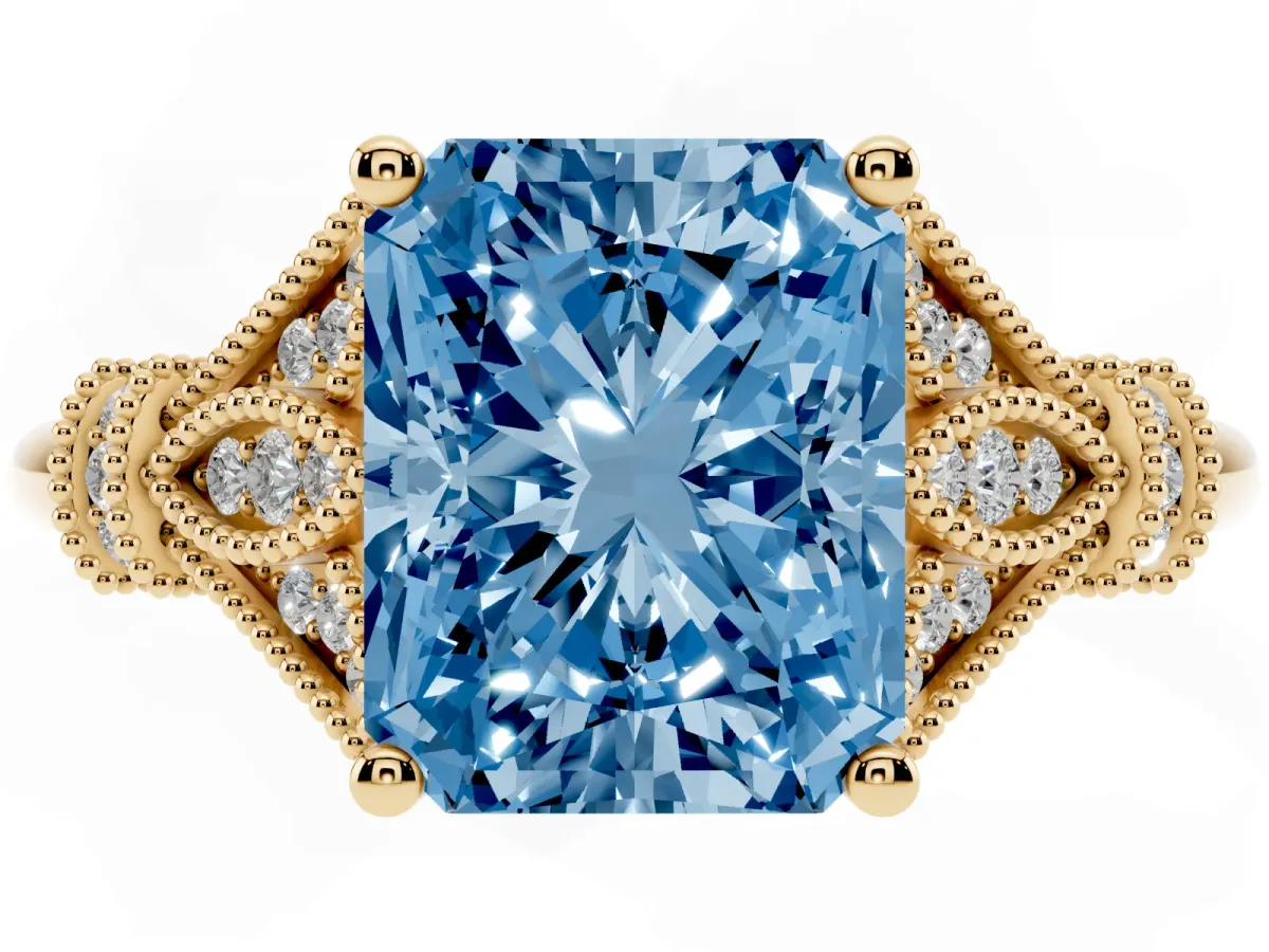 Fancy Blue Radiant Cut Diamond Solitaire Ring with Floral Filigree and Pave Accents Yellow gold