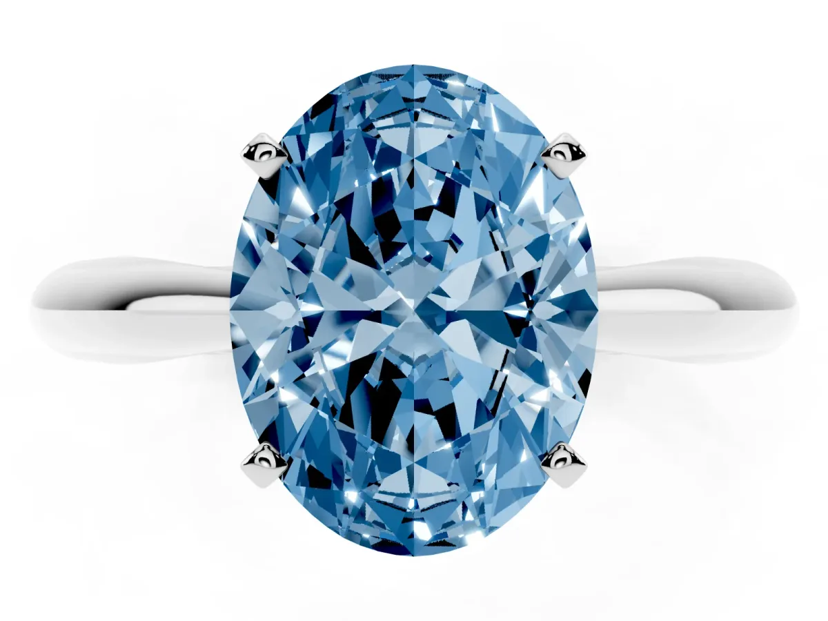 Fancy Blue Oval Cut Diamond Solitaire Engagement Ring with Cathedral Setting and Four-Prong Mount Silver