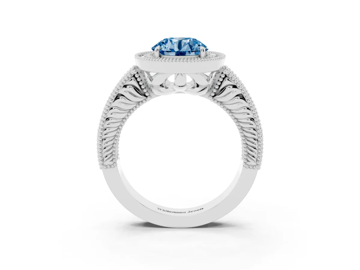 Fancy Blue Round Cut Cut Halo Diamond Ring with Pavé Band and Four-Prong Setting Silver