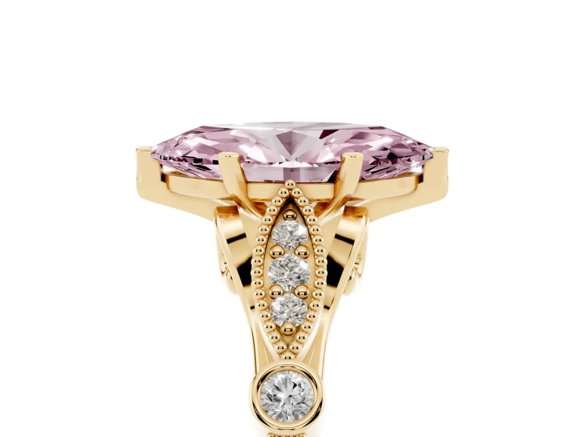 Fancy Pink Marquise Cut Cut Diamond with Milgrain Marquise and Bezel Accents on a Solitaire Band with Prong Setting Yellow gold
