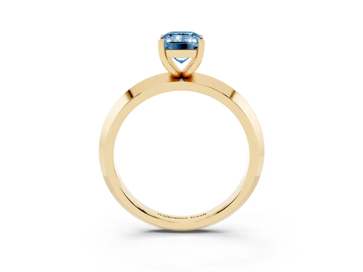 Fancy Blue Emerald Cut Cut Solitaire Engagement Ring with Flat Band and Four-Prong Setting Yellow gold