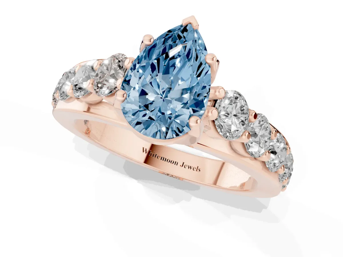 Fancy Blue Pear Cut Diamond Engagement Ring with Pavé Band and Four-Prong Setting Rose gold