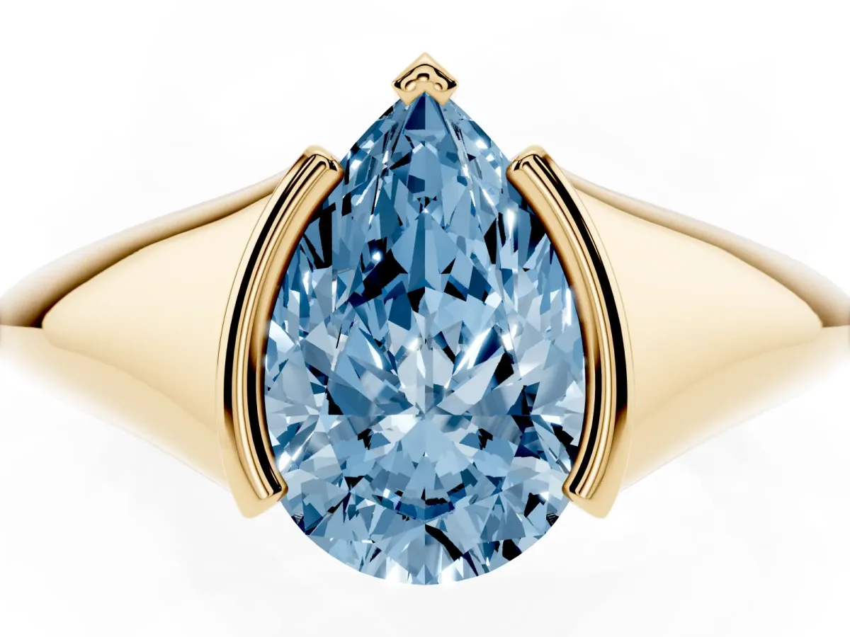 Fancy Blue Pear Cut Solitaire Tension Set Diamond Ring Yellow gold