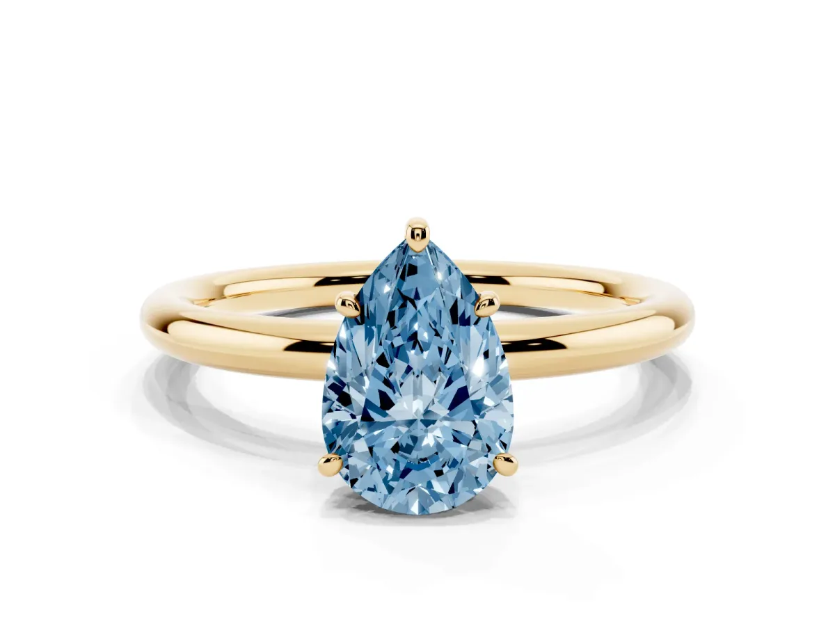 Fancy Blue Pear Cut Solitaire Diamond Ring with Four-Prong Setting on a Plain Band Yellow gold