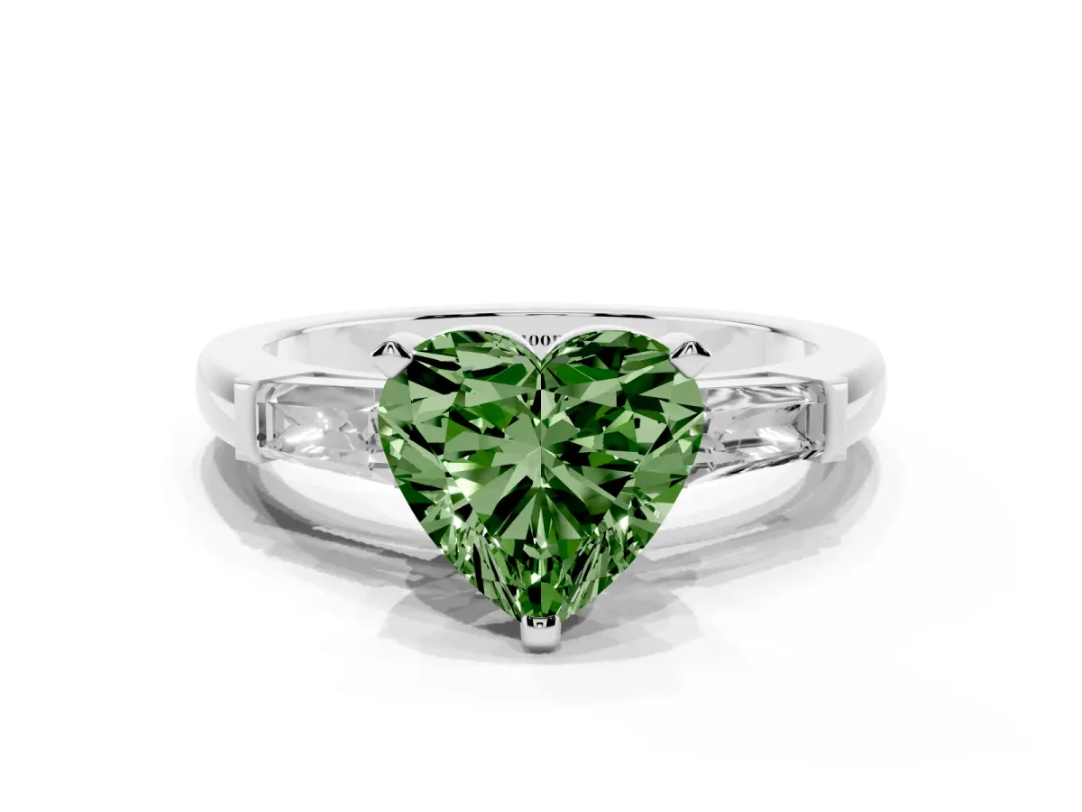 Fancy Green Heart Cut Solitaire with Tapered Baguette Side Stones on a Classic Band with Four-Prong Setting Silver