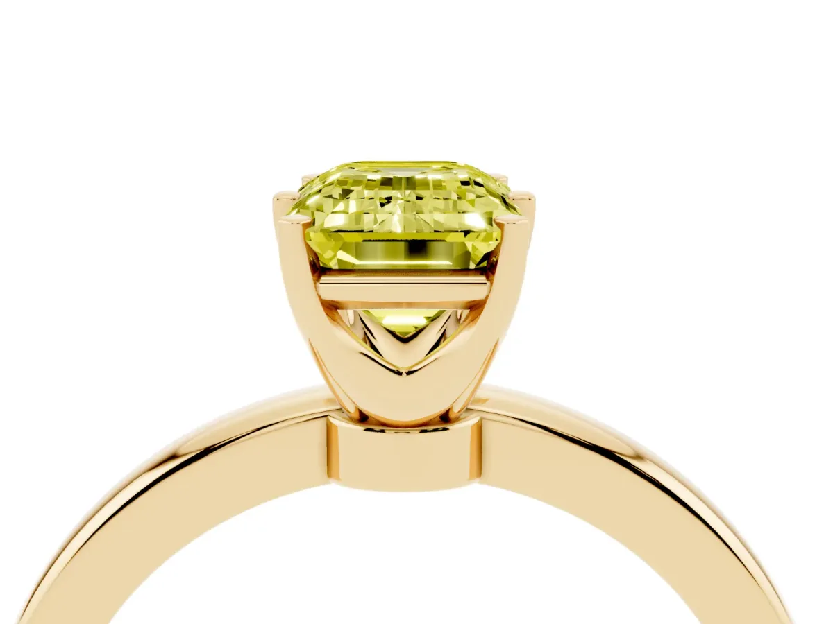 Fancy Yellow Emerald Cut Solitaire Diamond Ring with Six-Prong Setting on a Classic Band Yellow gold