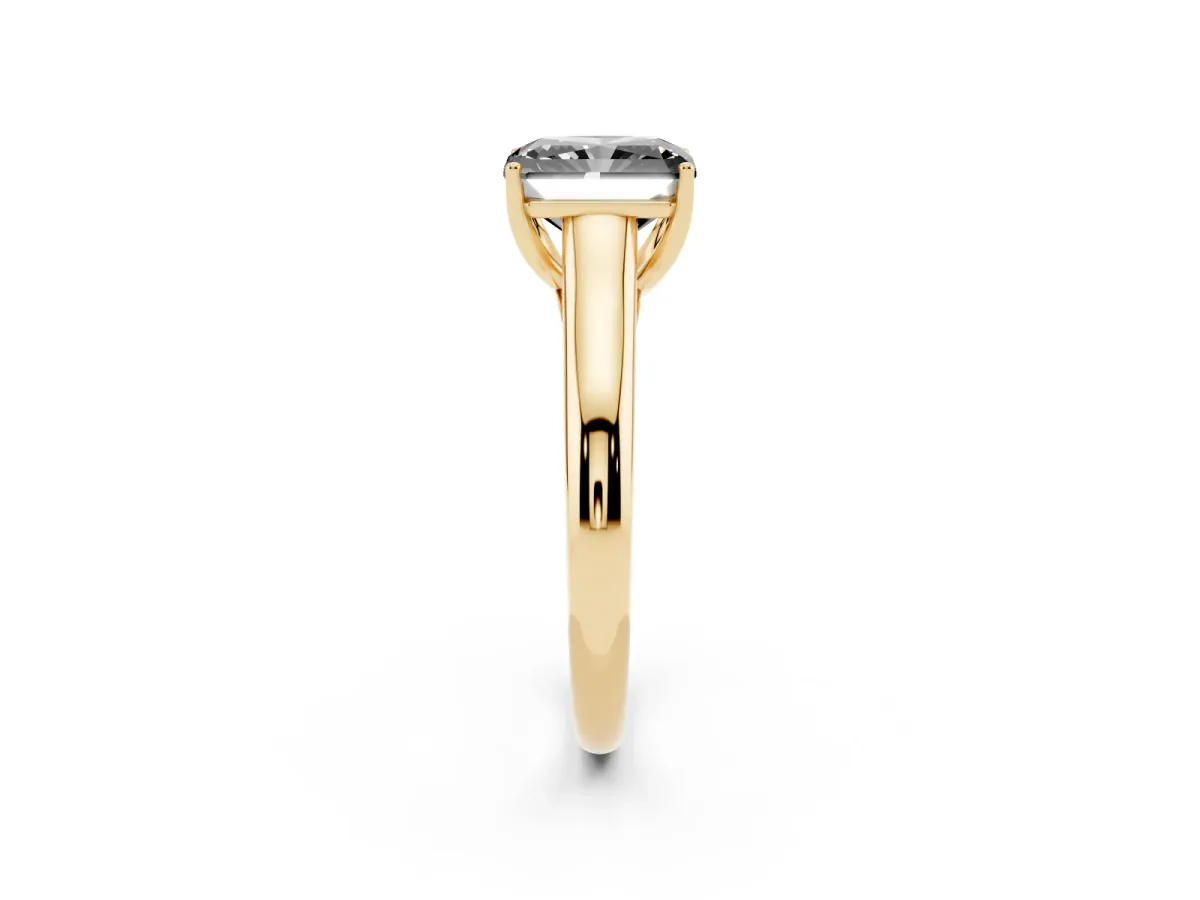 Fancy Black Radiant Cut Solitaire Engagement Ring with Tapered Band and Four-Prong Setting Yellow gold