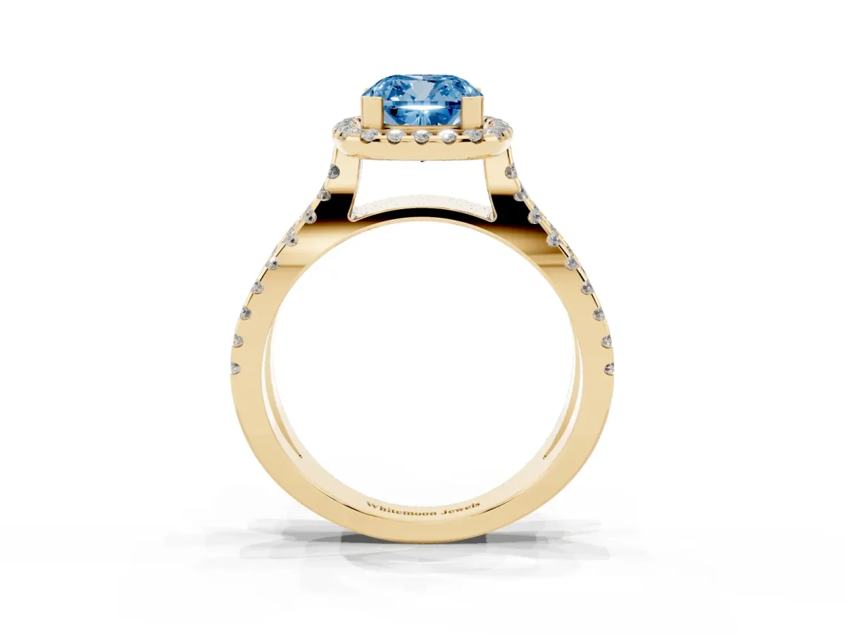 Fancy Blue Cushion Cut Diamond Halo Ring with Split Shank Pavé Band and Prong Setting Yellow gold
