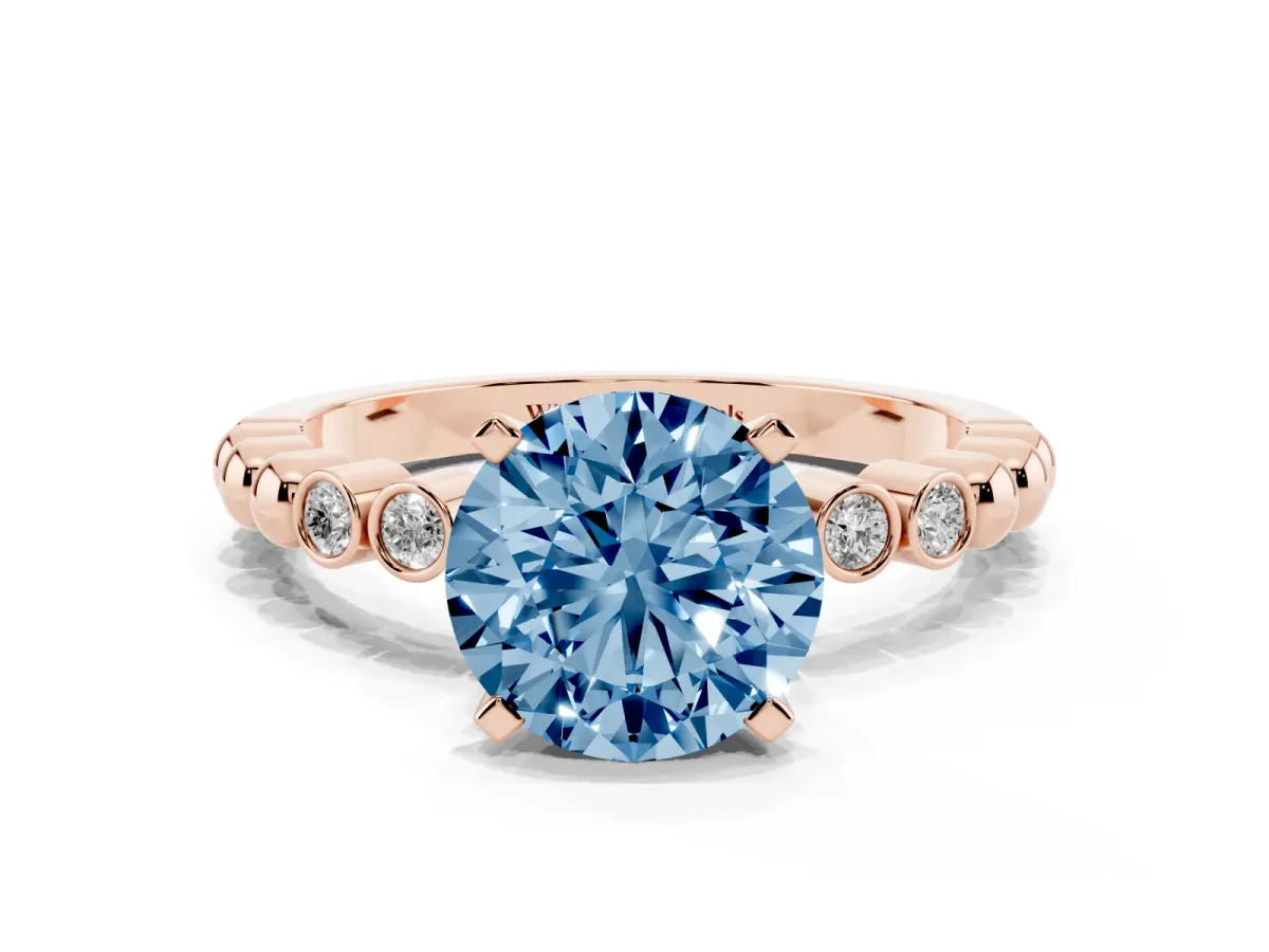 Fancy Blue Round Cut Solitaire Bezel Accent Diamond Engagement Ring with Beaded Band and Four-Prong Setting Rose gold