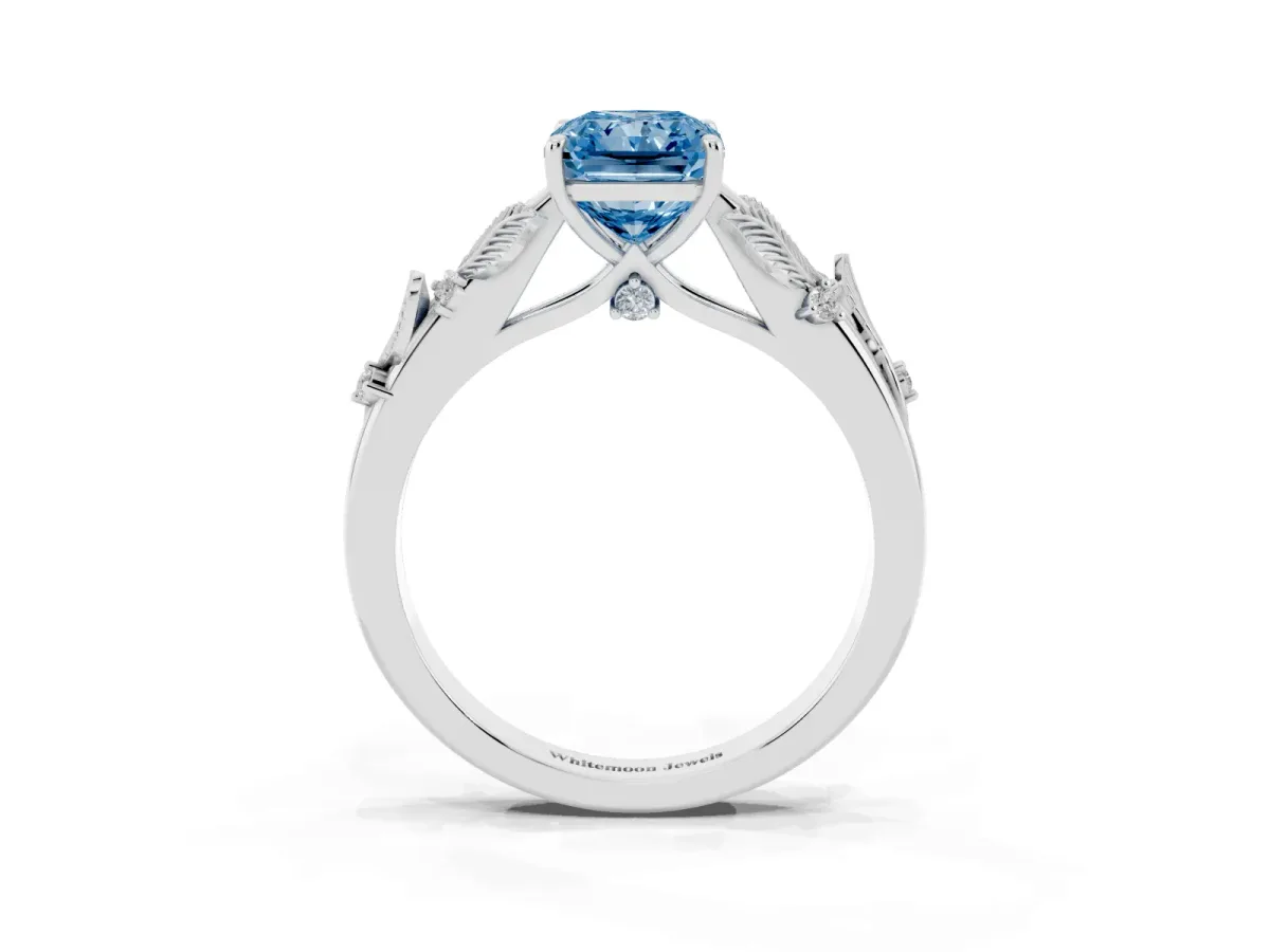Fancy Blue Radiant Cut Diamond Solitaire Ring with Leaf Motif Band and Four-Prong Setting Silver
