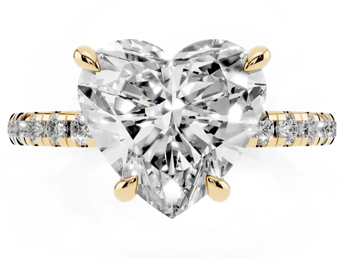 Heart Cut Diamond Brilliant Solitaire Ring with Pavé Band and Four-Prong Setting Yellow gold