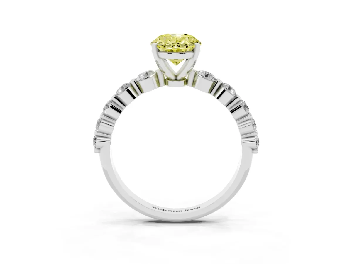 Fancy Yellow Oval Cut Solitaire Diamond Ring with Pave Band and Four-Prong Setting Silver