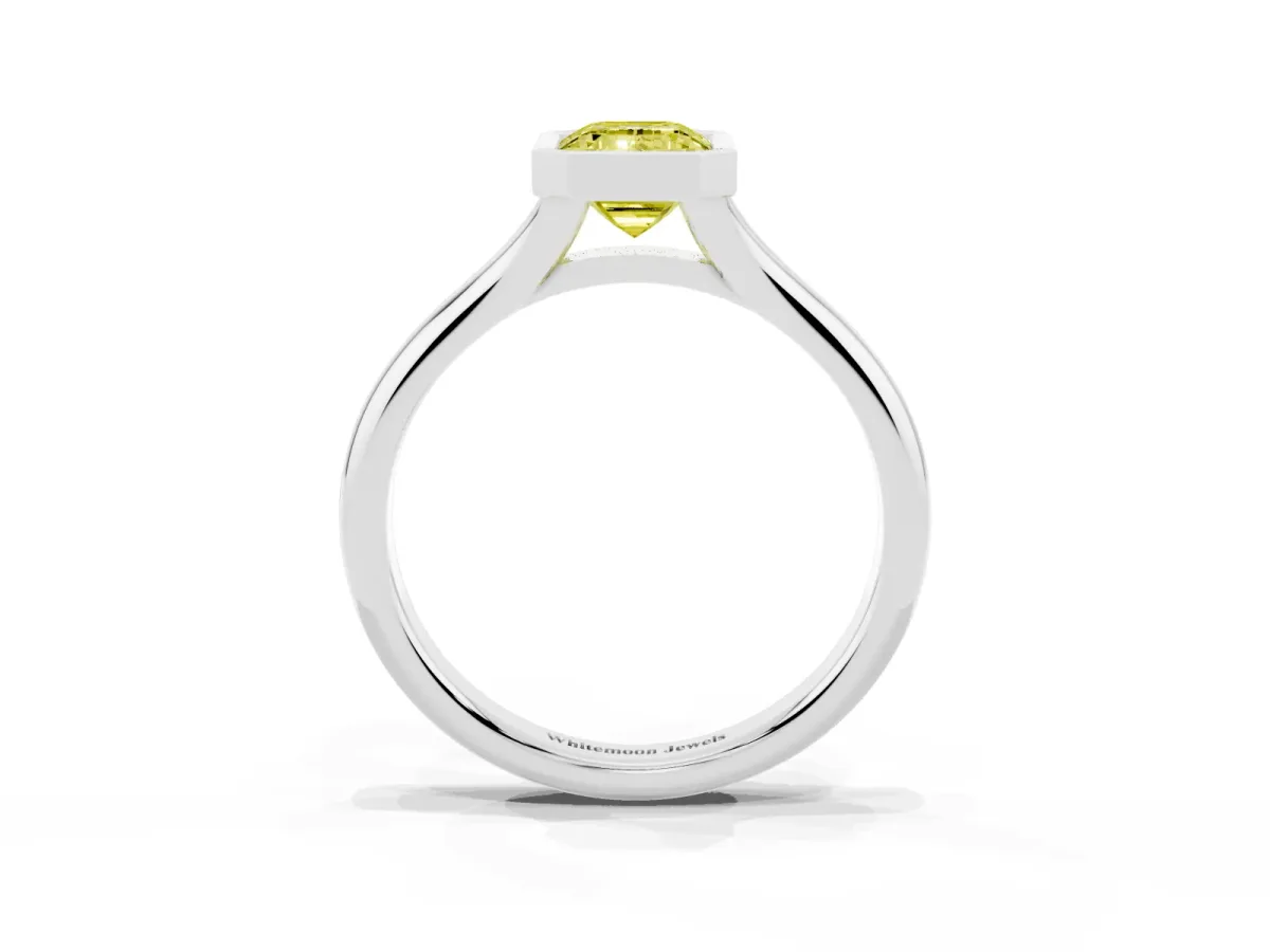 Fancy Yellow Bezel Set Emerald Cut Solitaire Diamond Ring with Smooth Band Silver