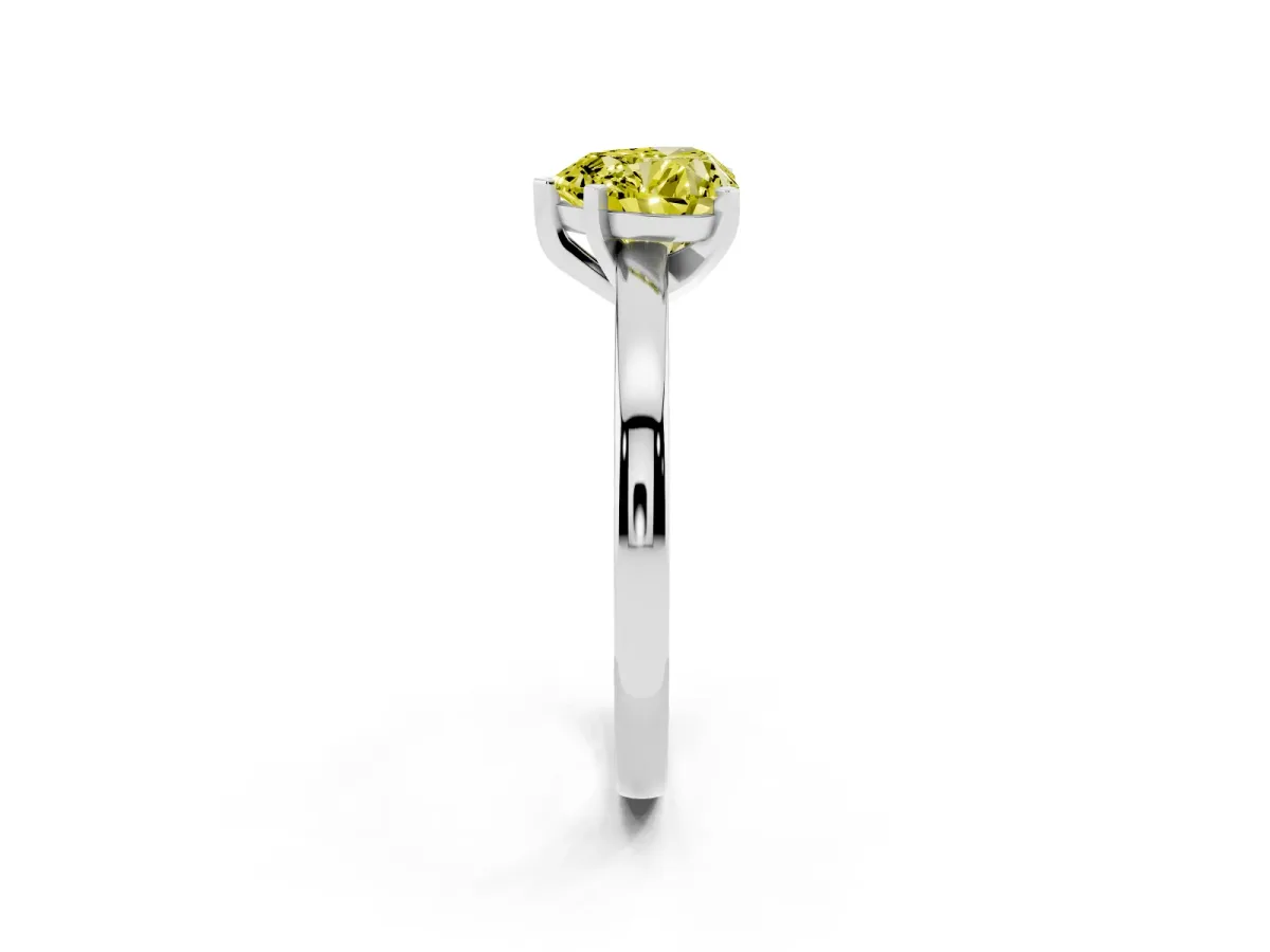 Fancy Yellow Heart Cut Solitaire Diamond Engagement Ring with Four-Prong Setting on a Classic Band Platinum