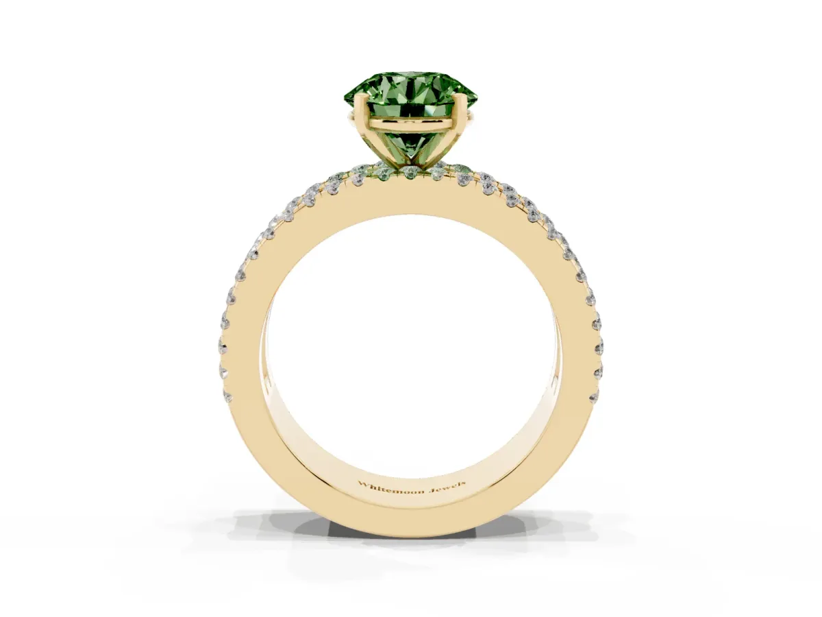 Fancy Green Round Cut Diamond Solitaire Ring with Pavé and Channel Set Band Yellow gold