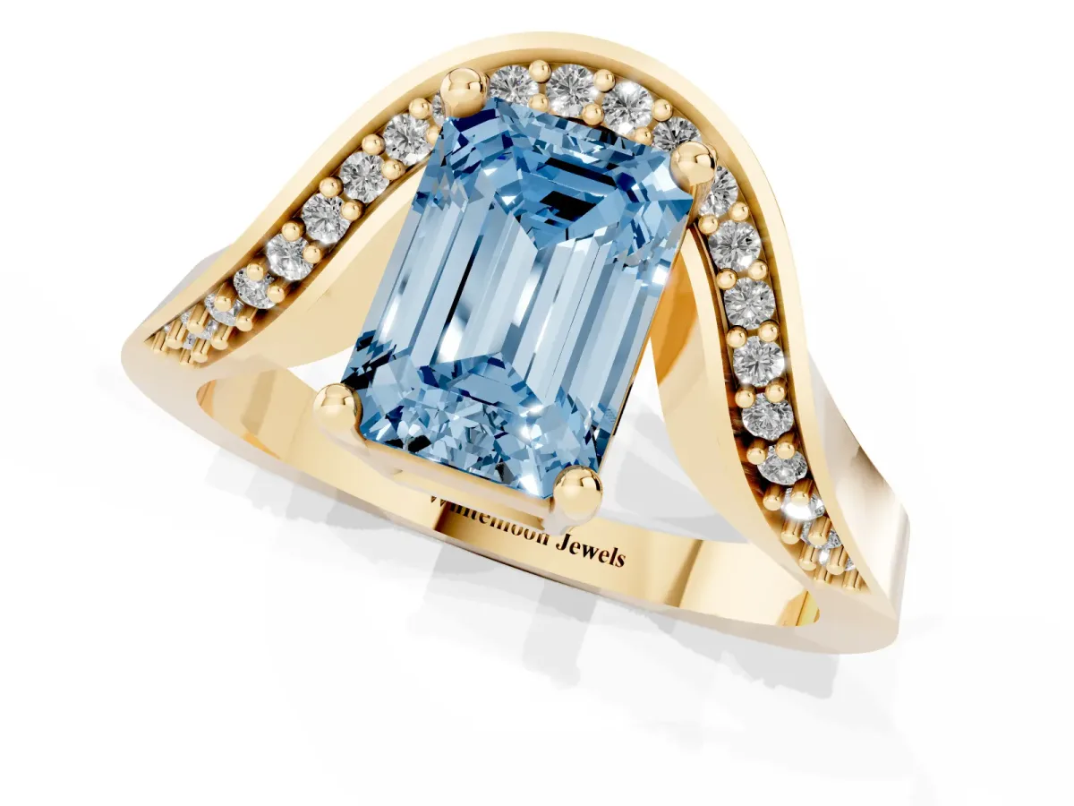 Fancy Blue Emerald Cut Solitaire Diamond Engagement Ring with Pave Band and Four-Prong Setting Yellow gold