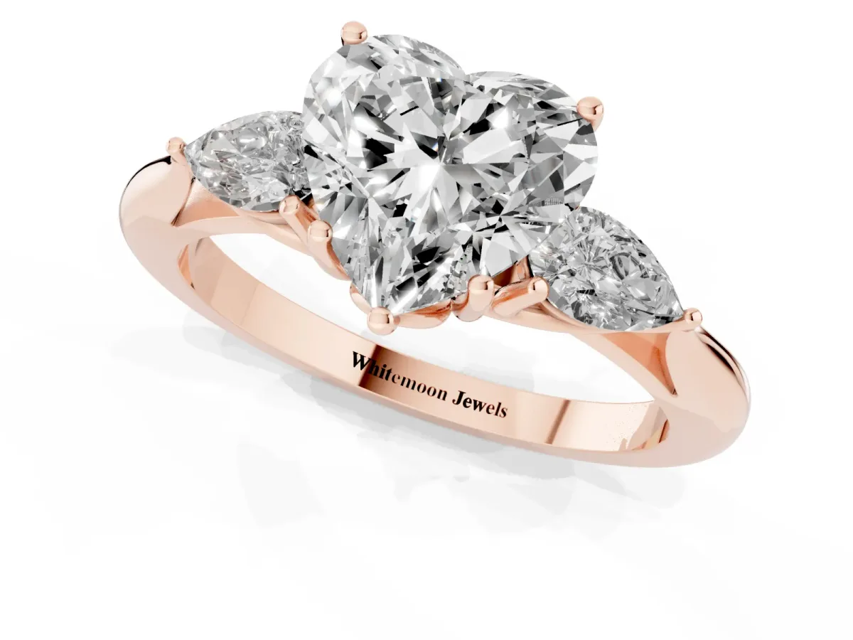 Three-Stone Heart Cut Brilliant Diamond Solitaire Ring with Tapered Band and Four-Prong Setting Rose gold