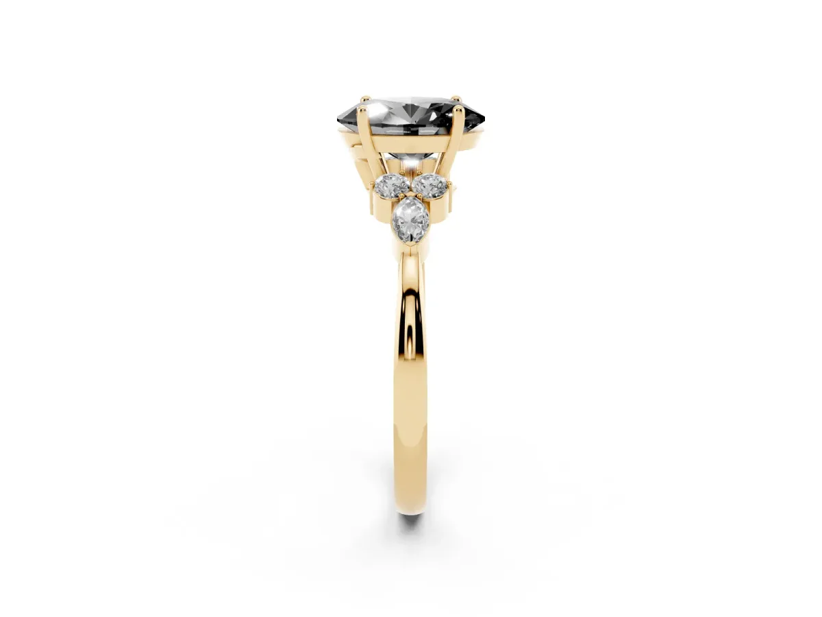 Fancy Black Oval Cut Brilliant Diamond Solitaire Ring with Pear Side Stones and Four-Prong Setting Yellow gold