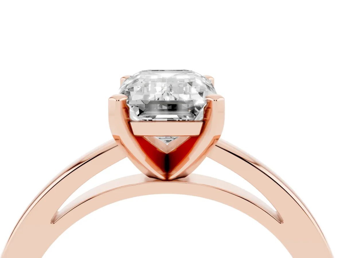 Emerald Cut Solitaire Diamond Engagement Ring with Four-Prong Setting on a Classic Band Rose gold