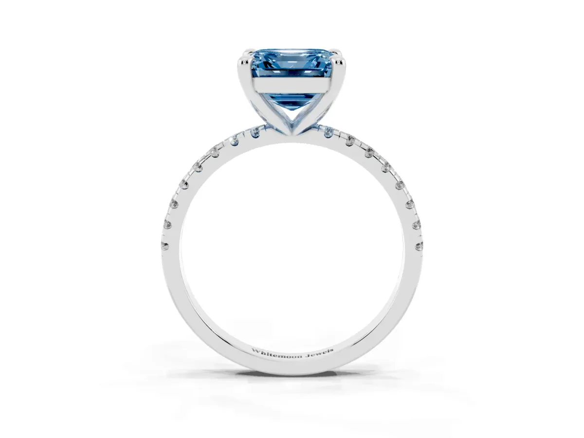 Fancy Blue Asscher Cut Diamond Brilliant Solitaire Ring with Pavé Band and Four-Prong Setting White gold