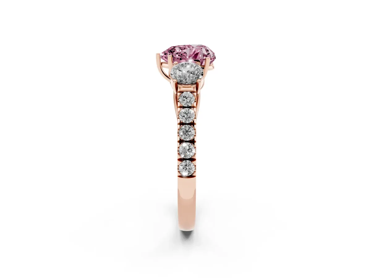 Fancy Pink Heart Cut Cut Diamond Three-Stone Ring with Round Side Stones and Pavé Band Rose gold