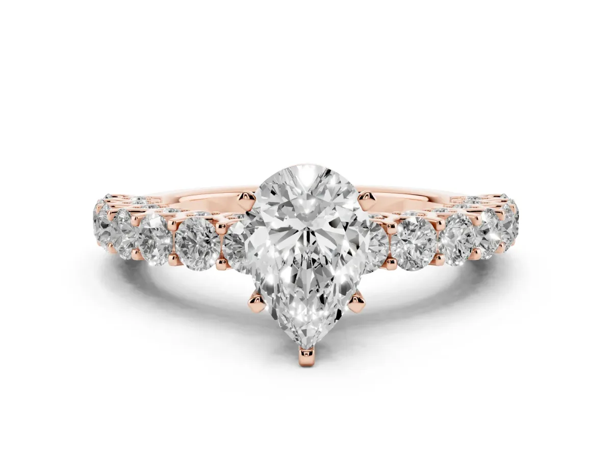 Pear Cut Diamond Solitaire Ring with Shared Prong Pavé Band and Four-Prong Setting Rose gold