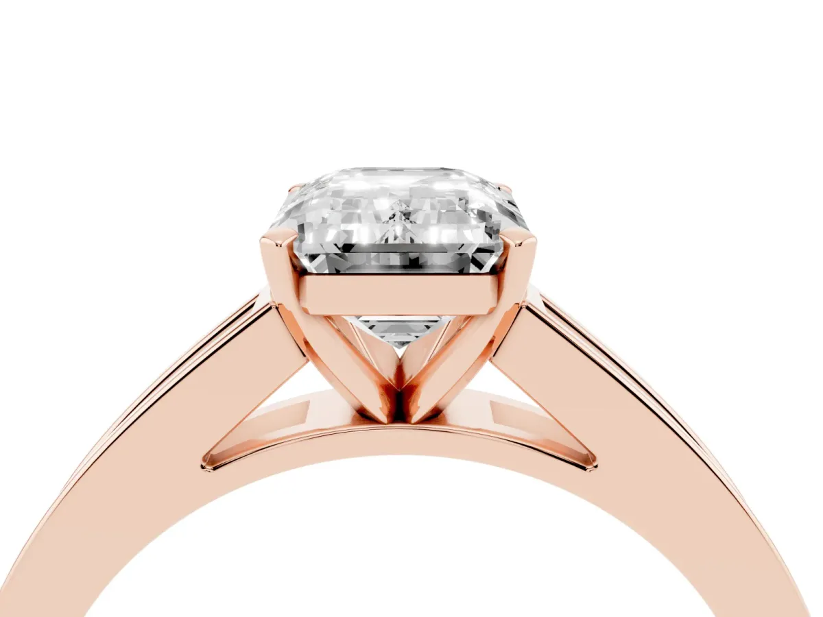 Emerald Cut Solitaire Diamond Ring with Channel-Set Band and Four-Prong Setting Rose gold