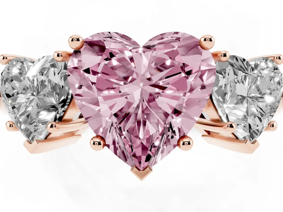 Fancy Pink Three-Stone Heart Cut Cut Diamond Engagement Ring with Prong Setting on a White Gold Band Rose gold