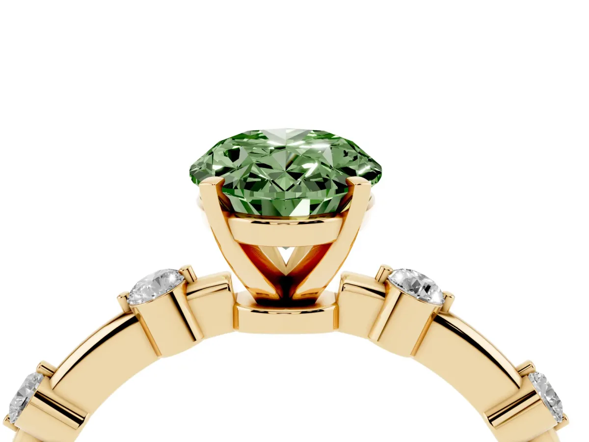 Fancy Green Oval Cut Solitaire Diamond Ring with Bezel Set Side Stones and Prong Setting Yellow gold