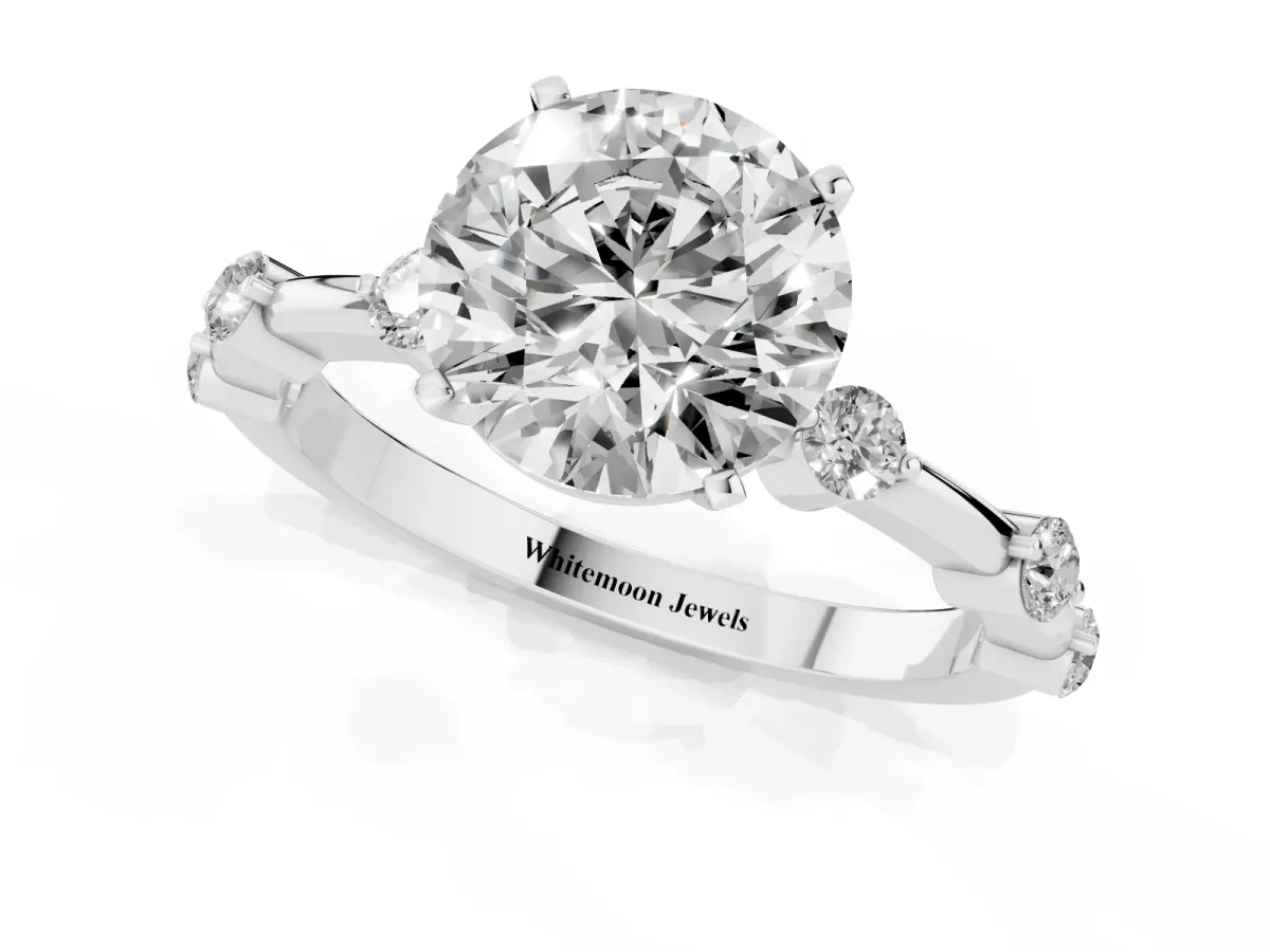 Round Cut Solitaire Diamond Ring with Bezel Set Side Stones and Prong Setting Silver