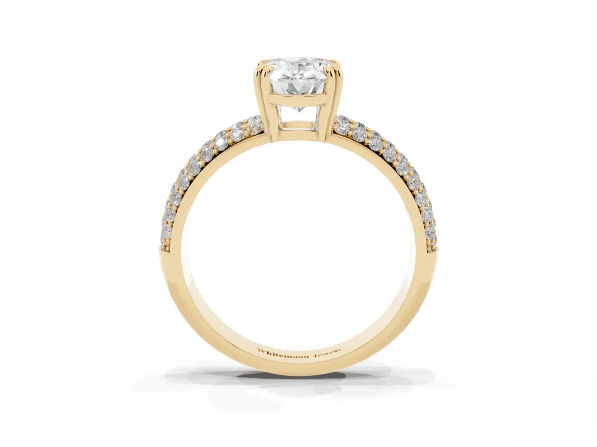 Oval Cut Diamond Solitaire Ring with Multi-Row Round Pavé Band and Prong Setting Yellow gold
