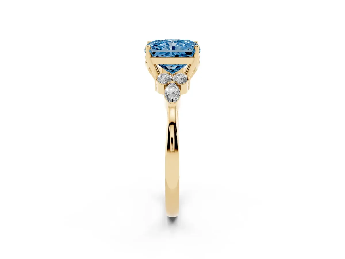 Fancy Blue Radiant Cut Brilliant Diamond Solitaire Ring with Pear Side Stones and Four-Prong Setting Yellow gold