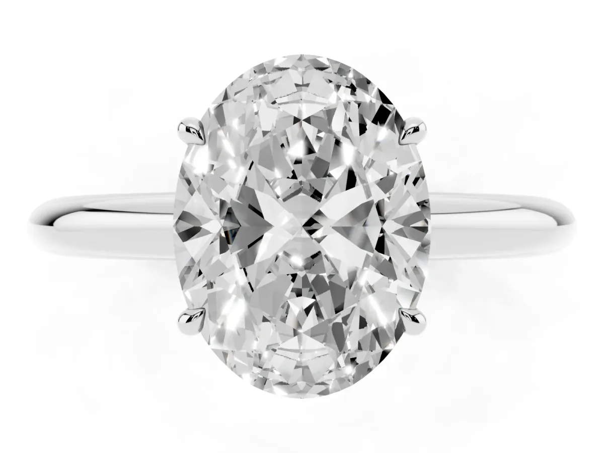 Oval Cut Brilliant Solitaire Engagement Ring with Six-Prong Setting and Classic Band White gold
