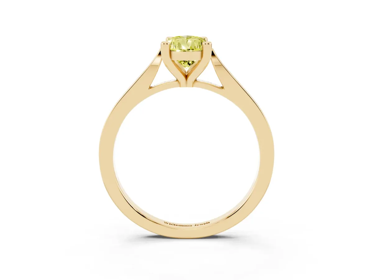Fancy Yellow Pear Cut Solitaire Diamond Ring with Four-Prong Setting and Tapered Band Yellow gold