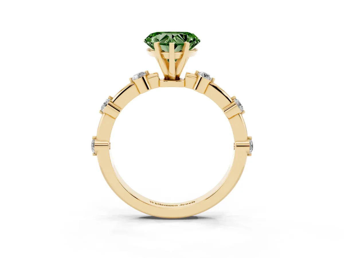 Fancy Green Heart Cut Solitaire Diamond Ring with Bezel Set Side Stones and Prong Setting Yellow gold