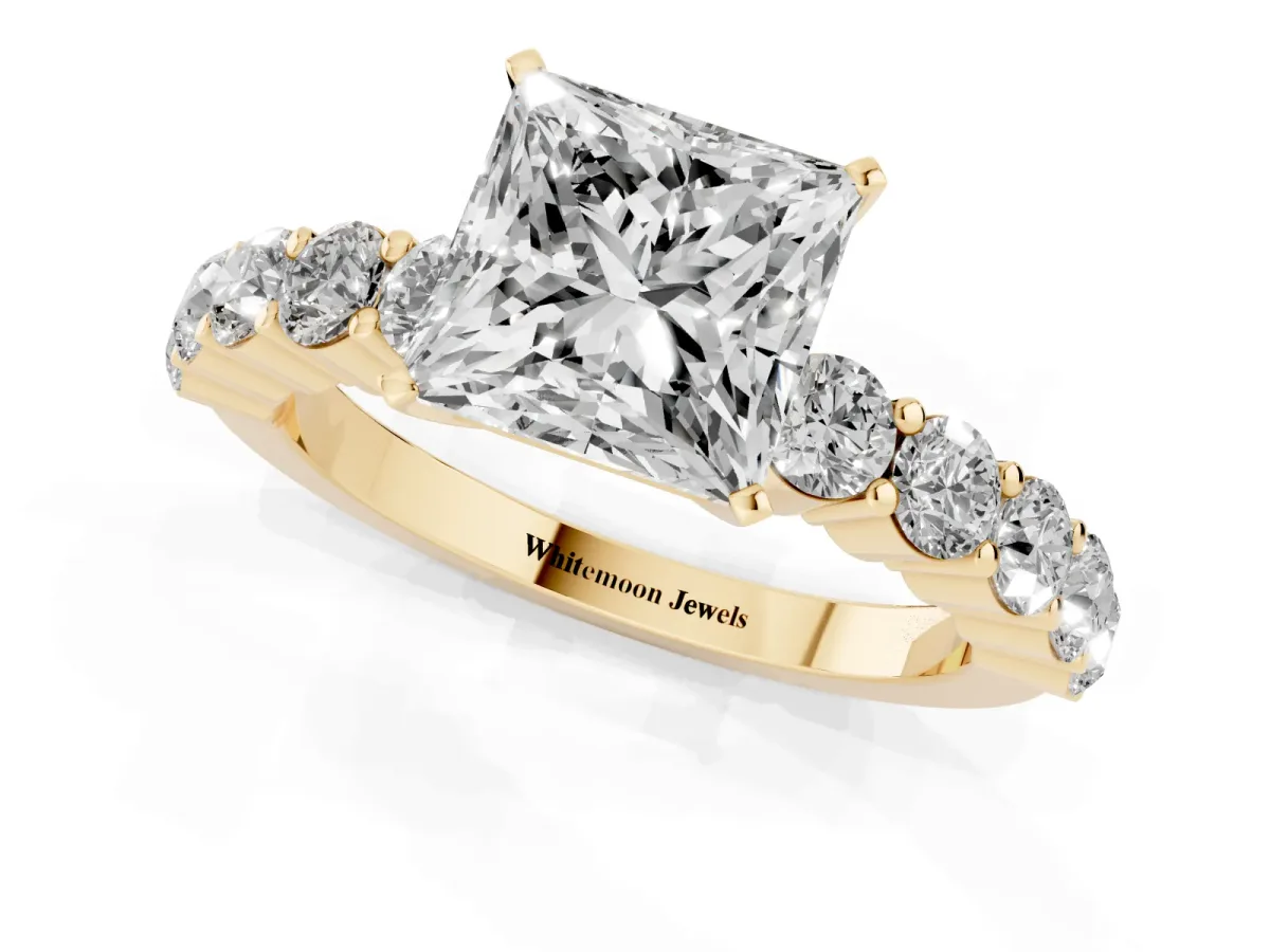 Princess Cut Diamond Solitaire Ring with Shared Prong Round Side Stones Yellow gold