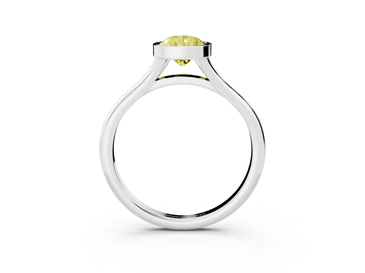 Fancy Yellow Bezel Set Pear Cut Cut Solitaire Ring with Tapered Band Silver