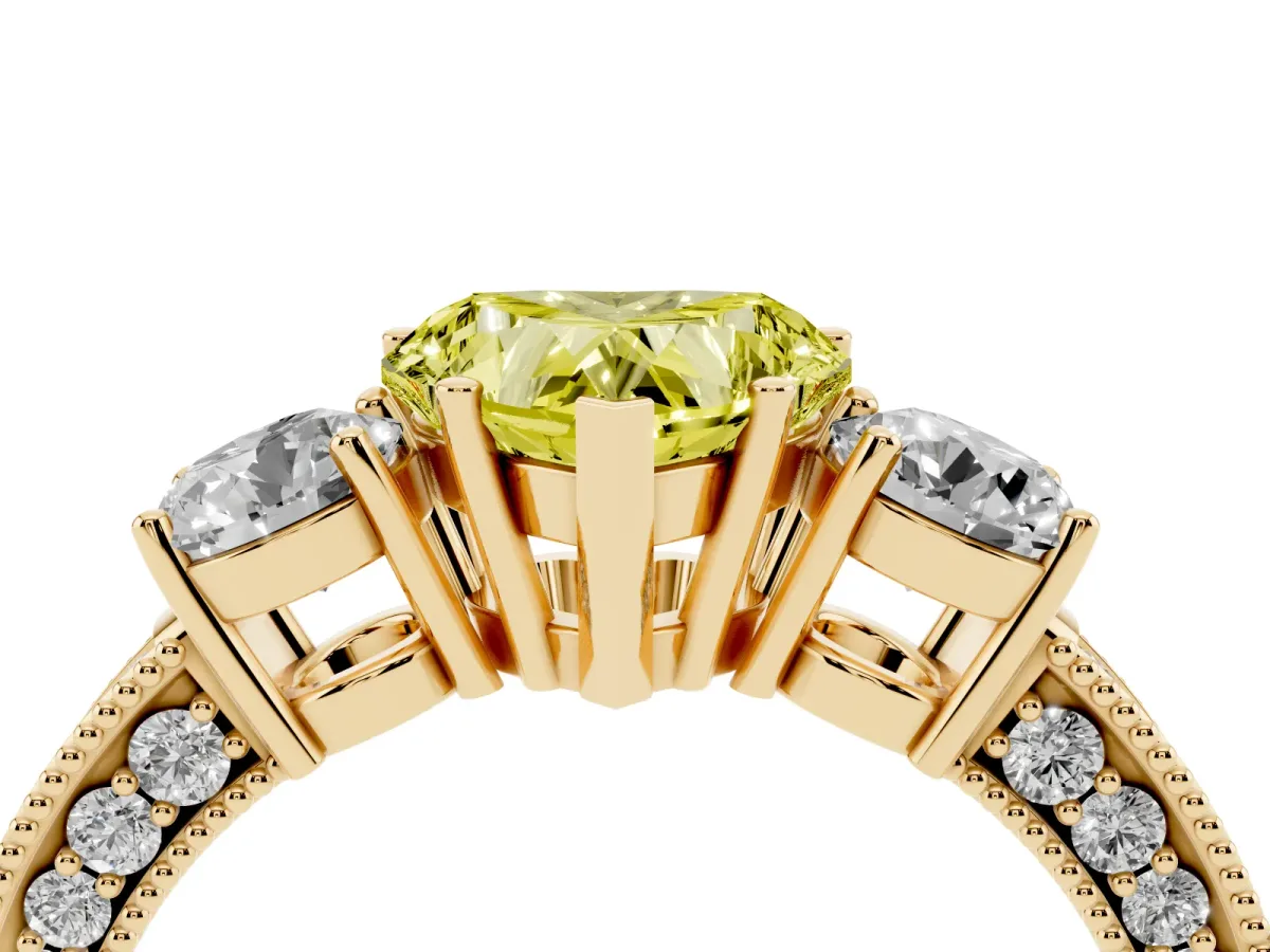 Fancy Yellow Heart Cut Three-Stone Diamond Ring with Pavé Band and Four-Prong Setting Yellow gold