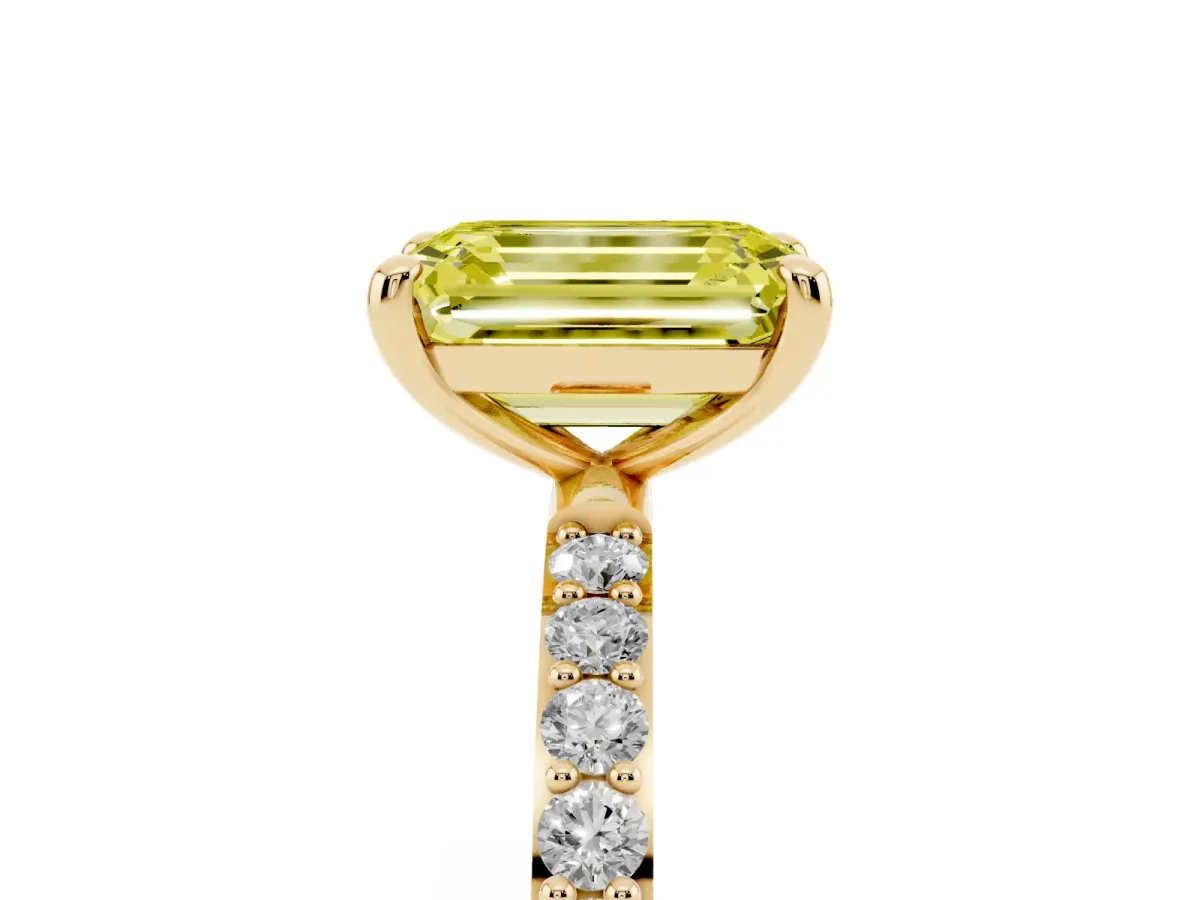 Fancy Yellow Emerald Cut Diamond Solitaire Ring with Round Pavé Band and Prong Setting Yellow gold