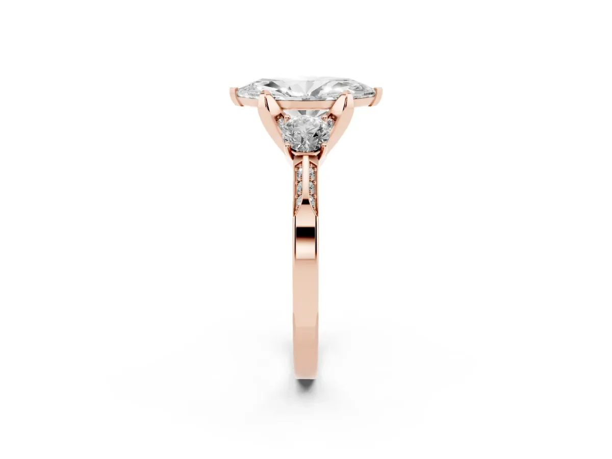 Marquise Cut Brilliant Three-Stone Diamond Ring with Pavé Band and Four-Prong Setting Rose gold