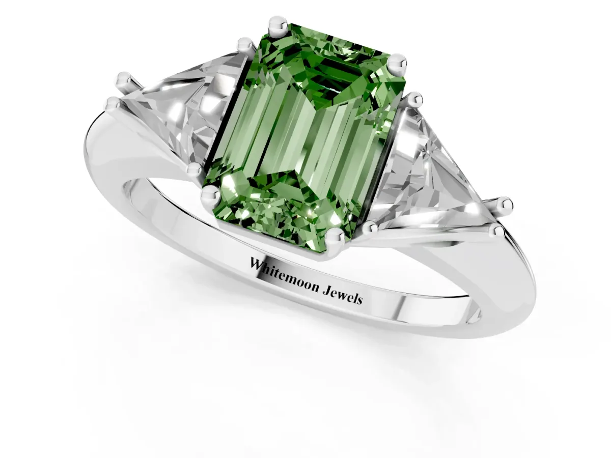 Fancy Green Three-Stone Emerald Cut Diamond Engagement Ring with Trillion Side Stones and Prong Setting Silver