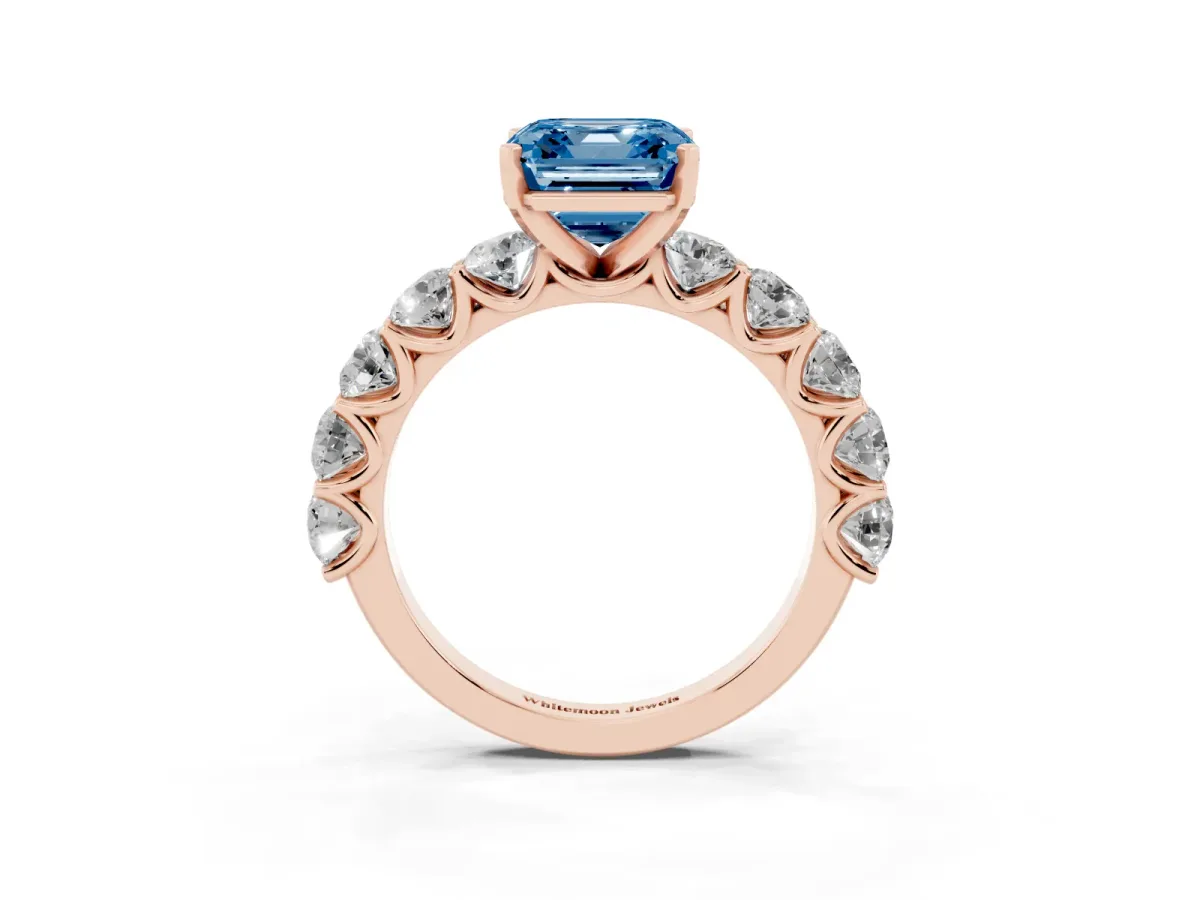 Fancy Blue Asscher Cut Diamond Prong Setting with Side Stones on a Pave Band Rose gold